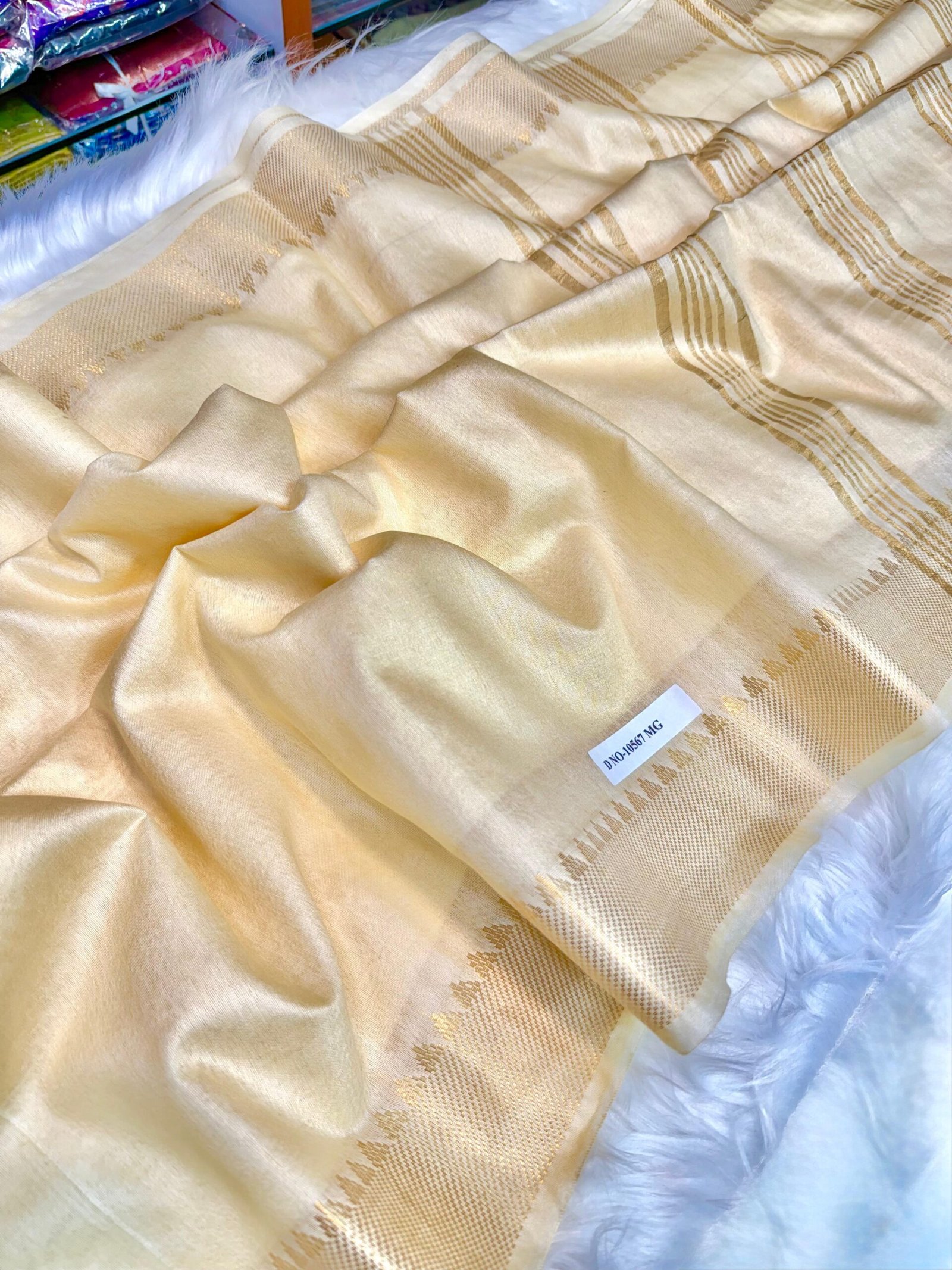 Exquisite Handcrafted Cream Bapta Tussar Mangalgiri Saree with Delicate Zari Accents