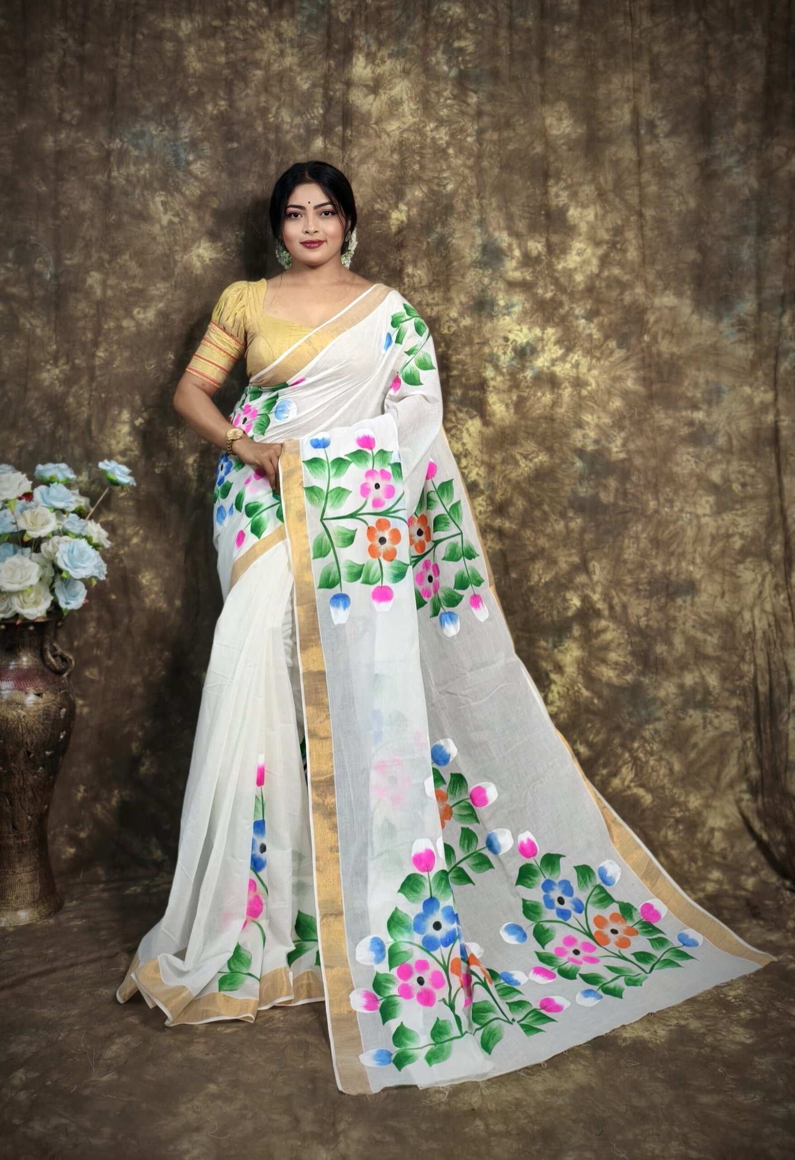 White Kerala Cotton Saree with Hand-Painted Art & Golden Border