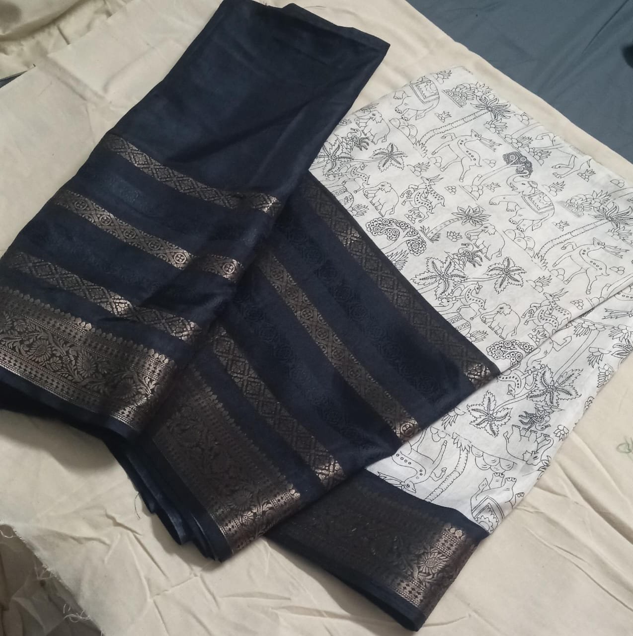 white and black saree