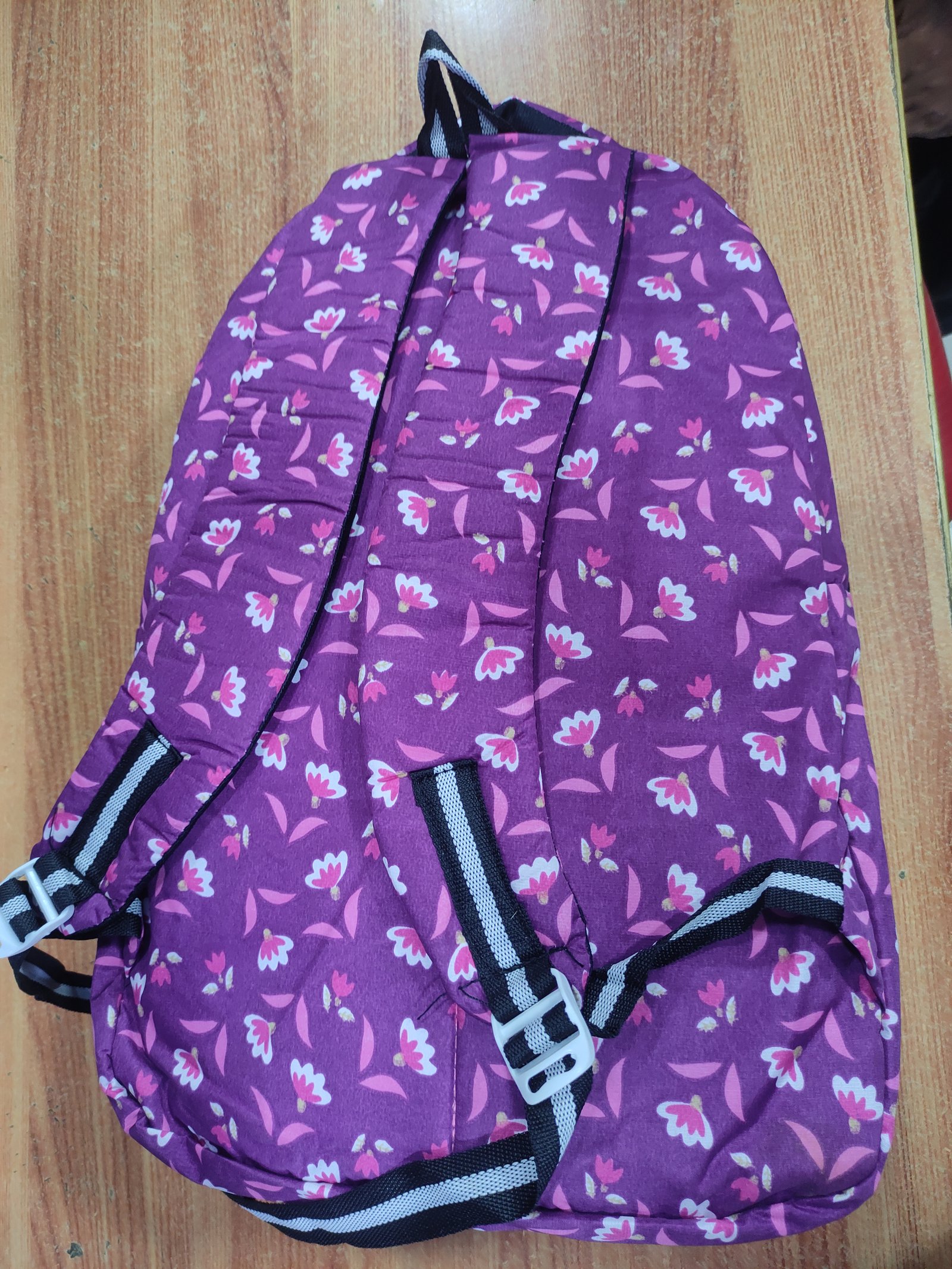 Genie Floral Print Lightweight School Backpack for Girls | Casual Travel Daypack with Front Zip Pocket for Bags online India