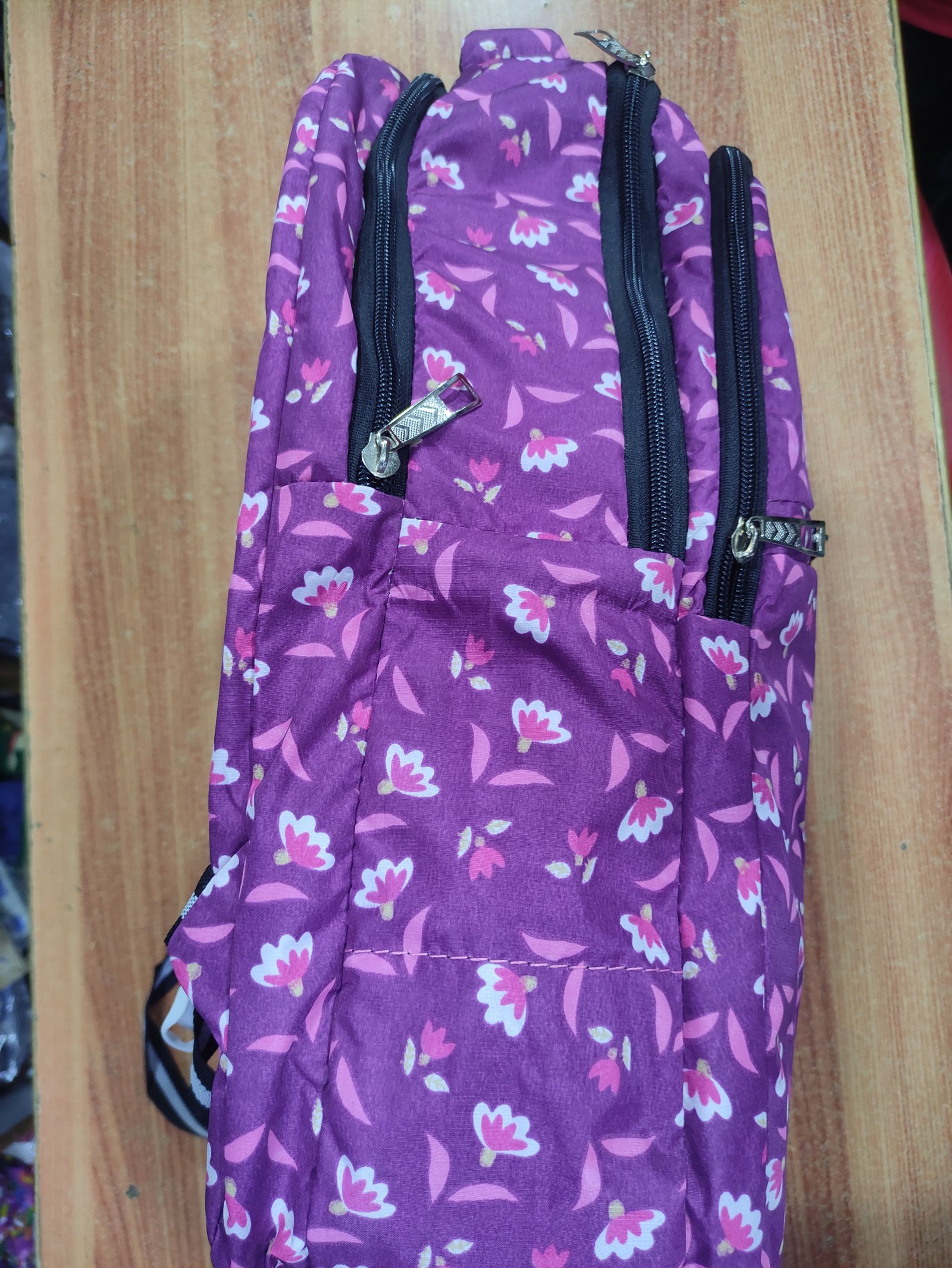 Genie Floral Print Lightweight School Backpack for Girls | Casual Travel Daypack with Front Zip Pocket for Bags online India