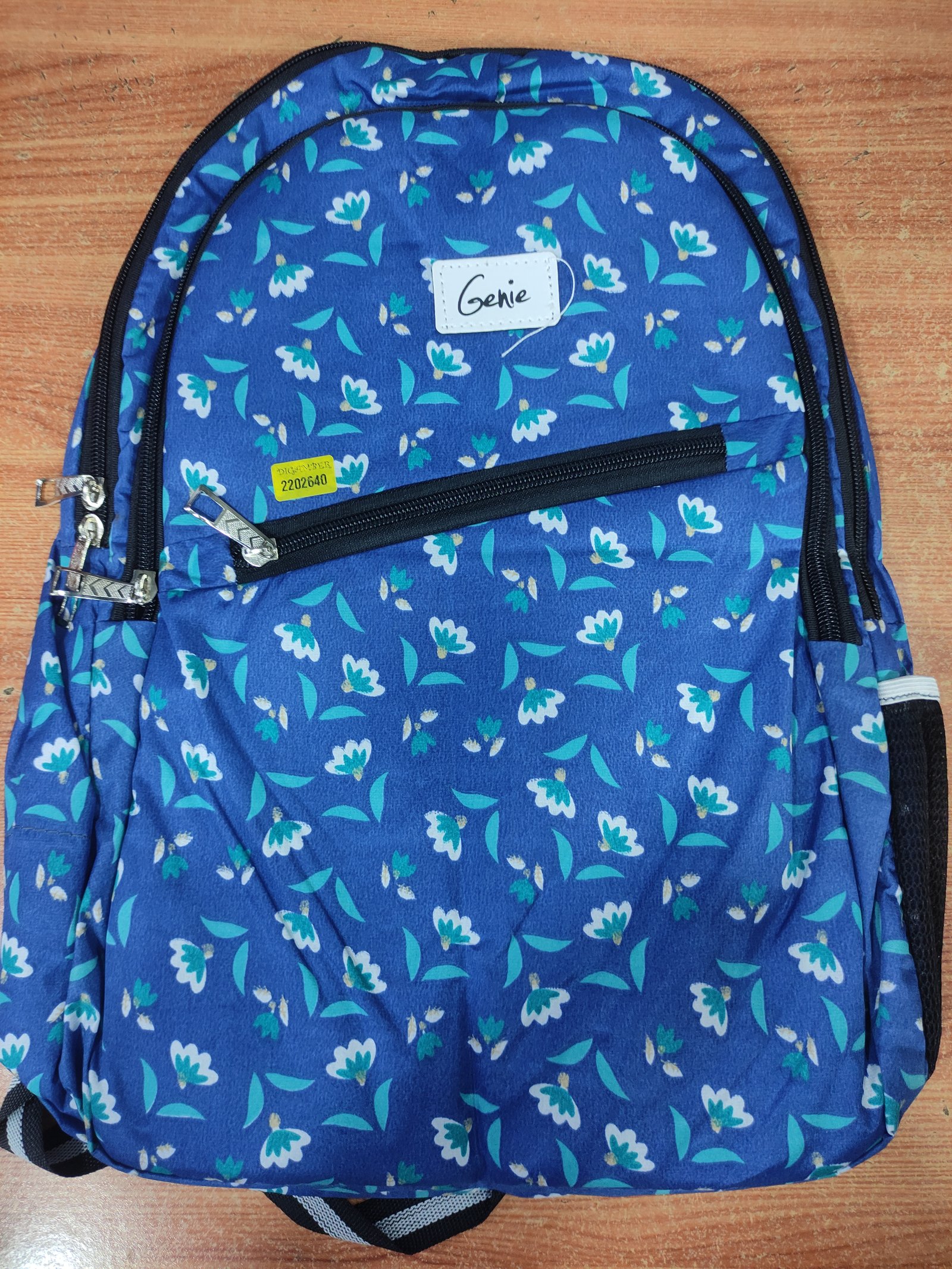 Genie Floral Print Lightweight School Backpack for Girls | Casual Travel Daypack with Front Zip Pocket for Bags online India