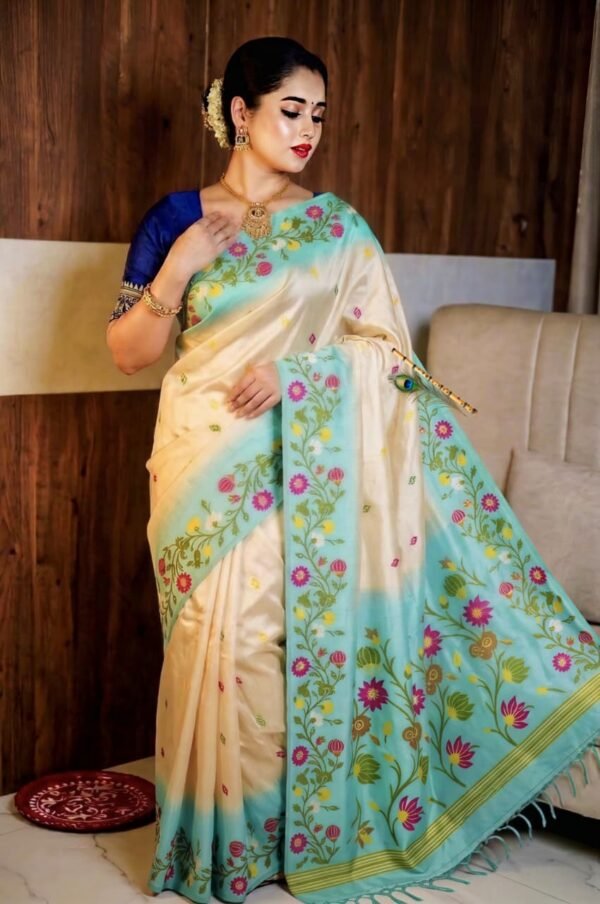 Elegant Handcrafted Ikkat Floral Work Aqua Mist Tussar Silk Saree with Blouse Piece